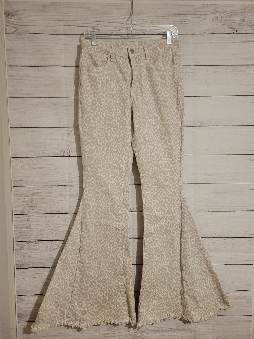 Altar’d State  pink White animal print flare leg jeans size Large